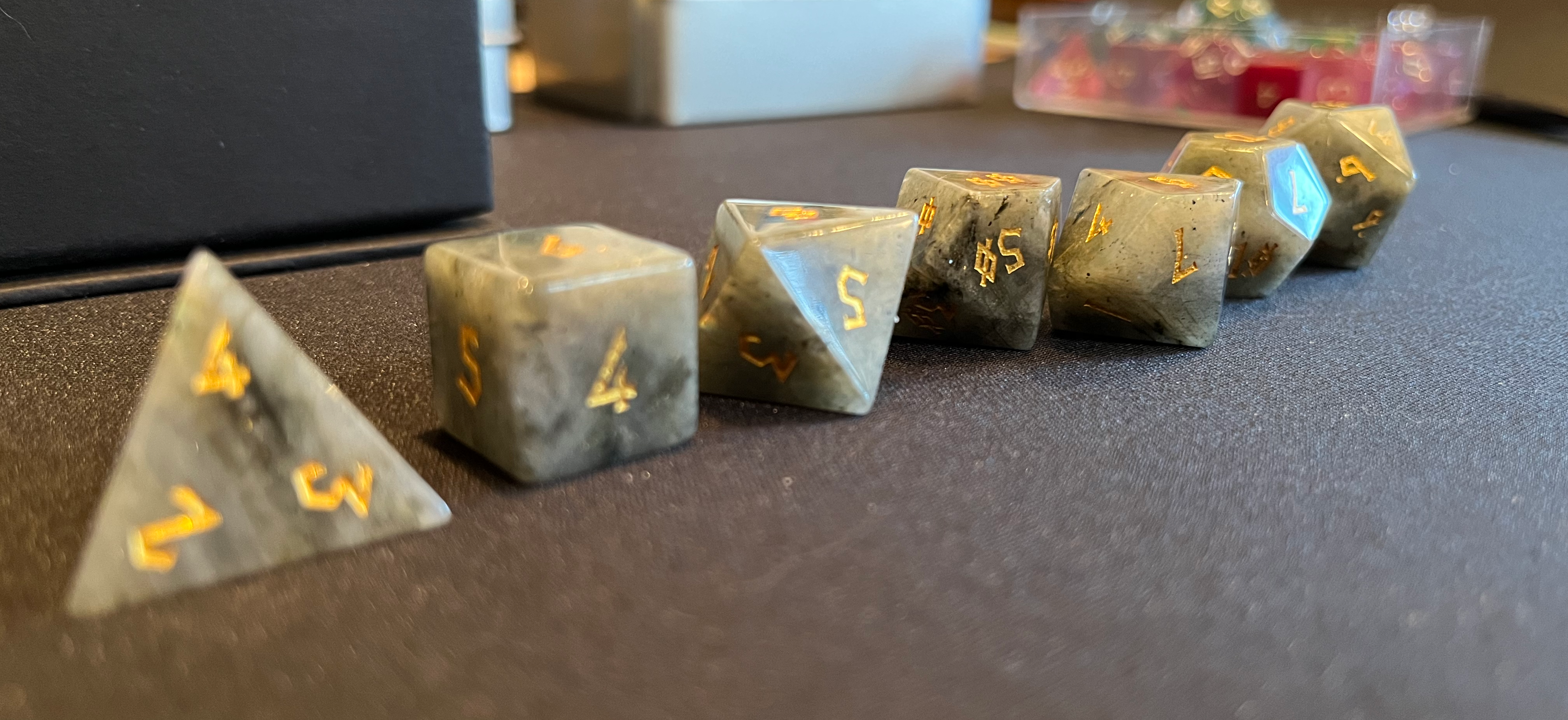The same moonstone dice as before, from the front.